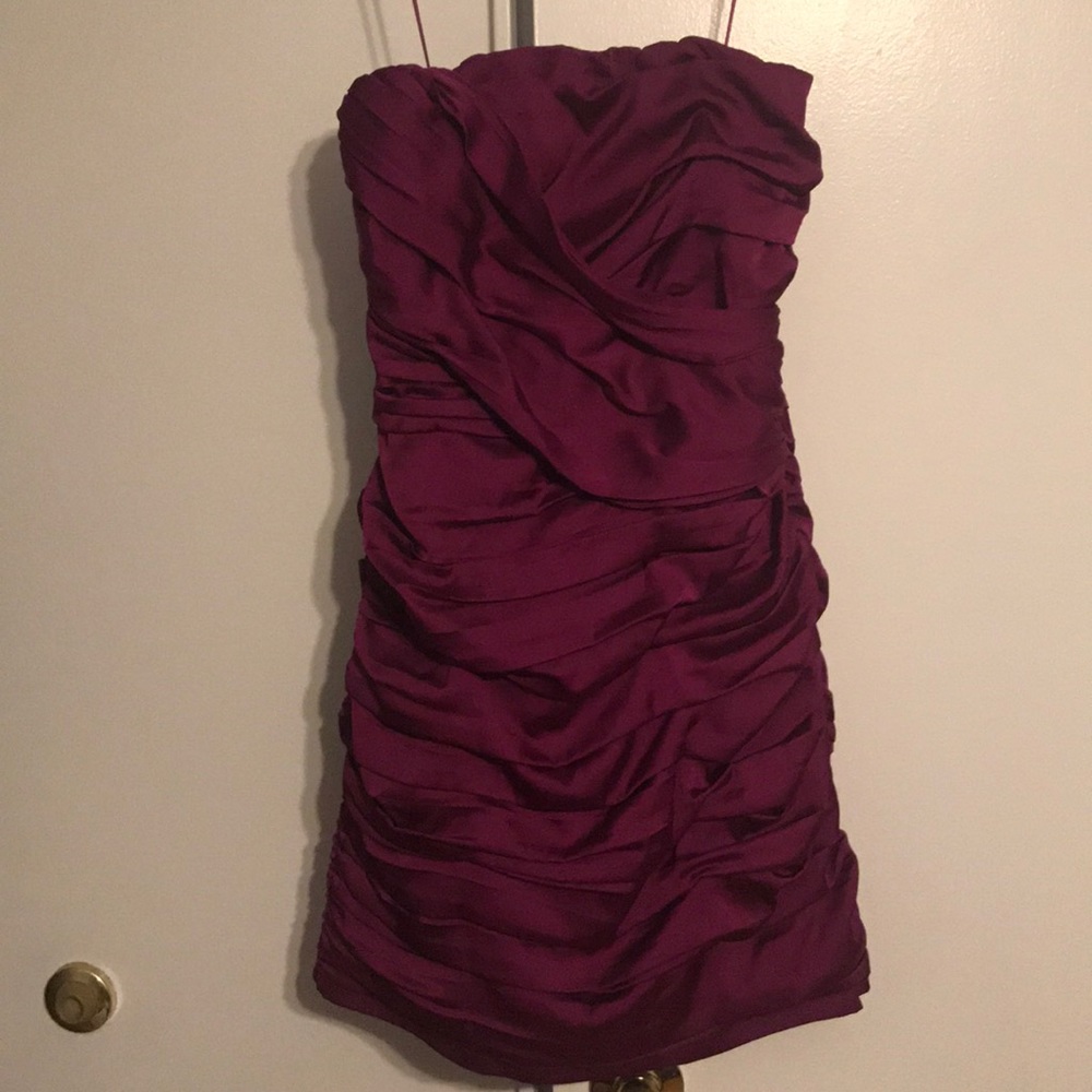Purple strapless mini roushed dress